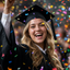 The Triumph Scholar woman graduation portrait